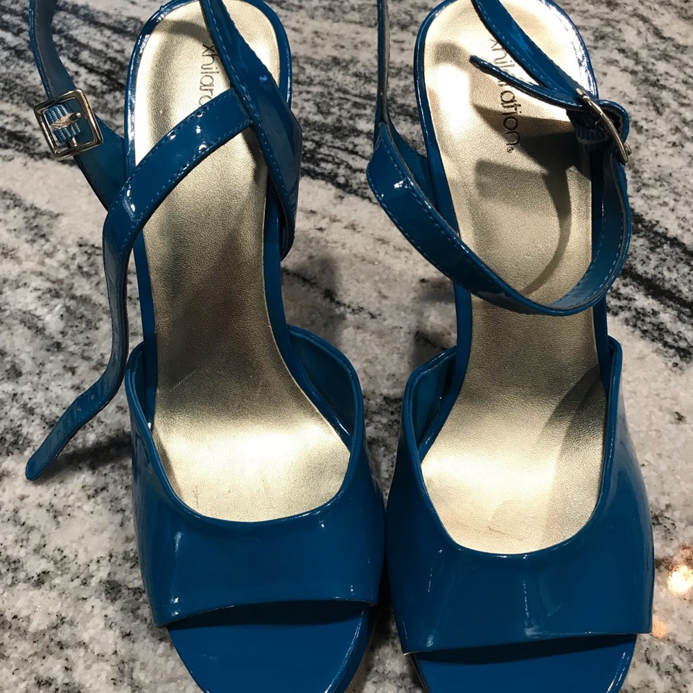 Electric Blue size 3 inch pumps.